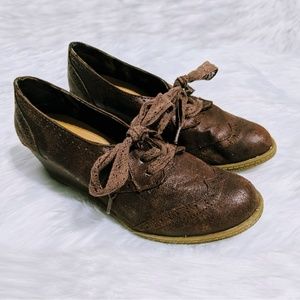 Brown lace-up oxford wedges